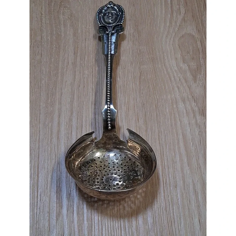 WOOD & HUGHES pierced Serving Ladle / Sifter MEDALLION 3D face. Rare 1870s